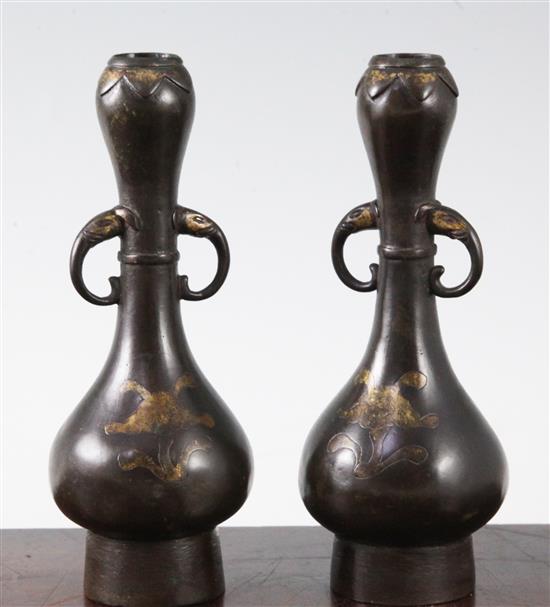 A pair of Chinese parcel-gilt bronze vases, late Ming, 16th century, height 17.5cm